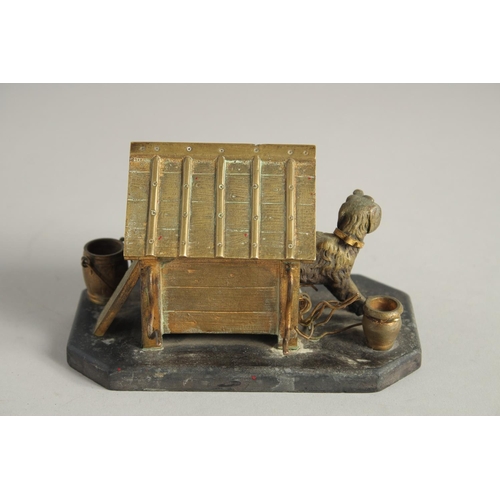 1411 - A BRONZE INKWELL, DOG IN A KENNEL on a marble base. 5ins long.