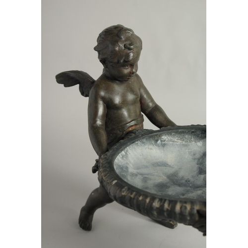 1424 - A GOOD 19TH CENTURY FRENCH SPELTER CENTREPIECE, a bowl held up by two cherubs.
16ins long.