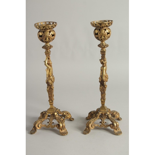 1425 - A GOOD PAIR OF ORMOLU CANDLESTICKS, ROCOCCO with classical female figure. 12ins high.