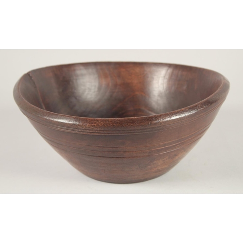 1431 - A TREEN BUTTER BOWL 10ins diameter.