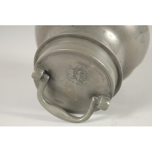 1445 - AN 18TH CENTURY FRENCH PEWTER BULBOUS CAN AND COVER with carrying handles. 7ins high, bears Paris sc... 