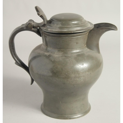 1448 - AN EARLY PEWTER ALE JUG AND COVER. 9ins high.