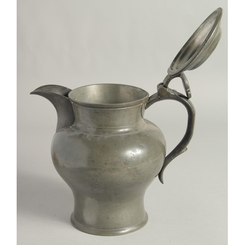 1448 - AN EARLY PEWTER ALE JUG AND COVER. 9ins high.