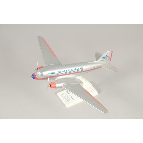 1460 - A COLLECTION OF EIGHT PLASTIC AND METAL AEROPLANES.