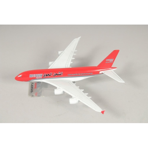 1460 - A COLLECTION OF EIGHT PLASTIC AND METAL AEROPLANES.