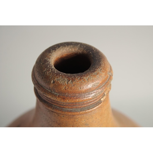 1462 - A VERY LARGE EARLY STONEWARE FLAGON. 18in high.