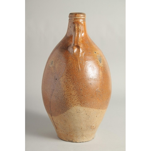 1463 - A LARGE EARLY STONEWARE FLAGON. 16ins high.