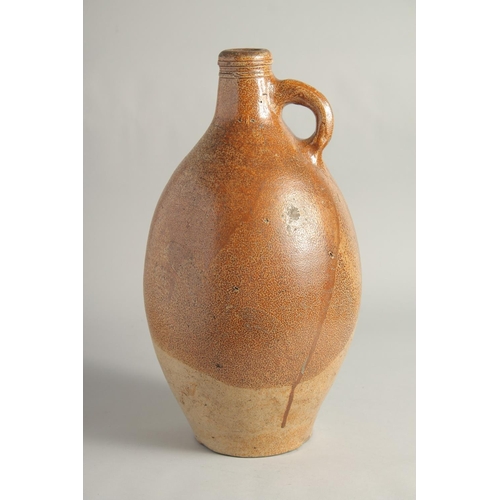 1463 - A LARGE EARLY STONEWARE FLAGON. 16ins high.