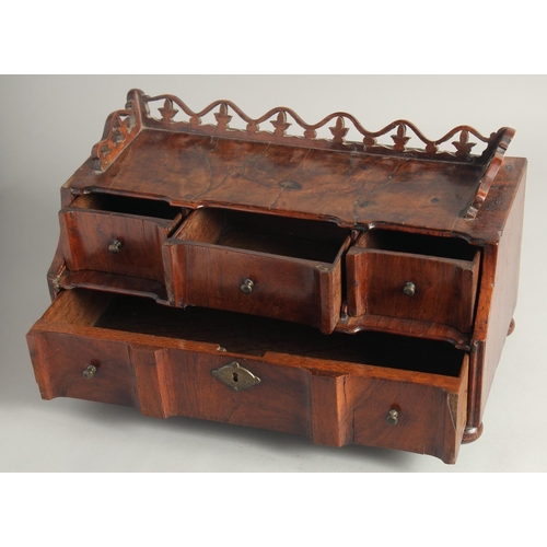 1465 - A GOOD GEORGIAN MAHOGANY DRESSING TABLE BASE, with pierced fret carving, one long and three small dr... 