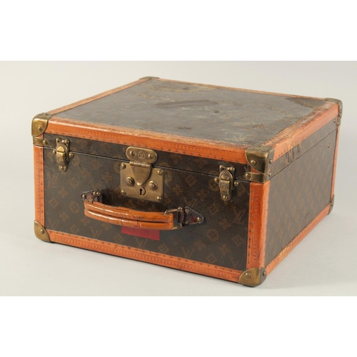 1496 - A LOUIS VUITTON HAT BOX with key. No. 104637. Bought from Saks & Co., Fifth Avenue, New York. Bears ... 