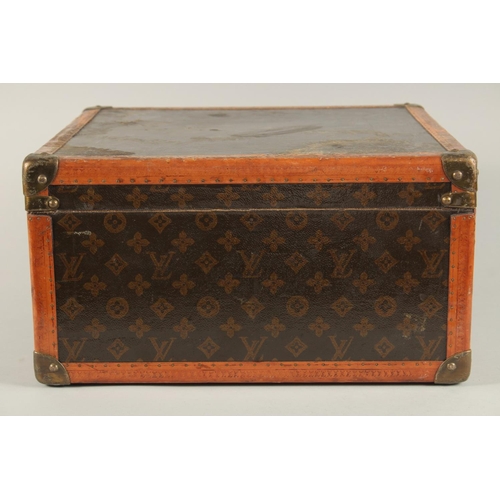 1496 - A LOUIS VUITTON HAT BOX with key. No. 104637. Bought from Saks & Co., Fifth Avenue, New York. Bears ... 