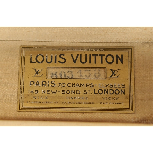 1496 - A LOUIS VUITTON HAT BOX with key. No. 104637. Bought from Saks & Co., Fifth Avenue, New York. Bears ... 