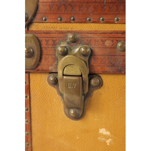 1497 - A LOUIS VUITTON SUITCASE. No. 736514. Plain leather with LV monogram banding. 25ins long x 15.5ins w... 