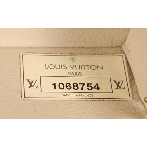 1498 - A LARGE LOUIS VUITTON SUITCASE. No. 1068754. With Louis Vuitton label. Lock no. 1262082. 31.5ins lon... 