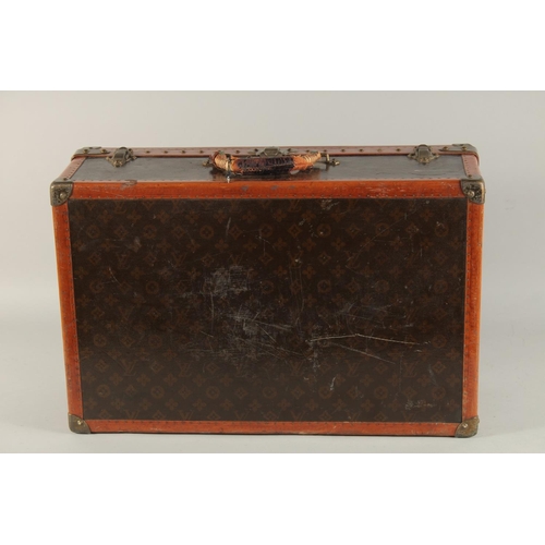 1503 - A LOUIS VUITTON SUITCASE. No. 795837 with Louis Vuitton label, pull-out tray. Lock no. 106402. 23.5i... 