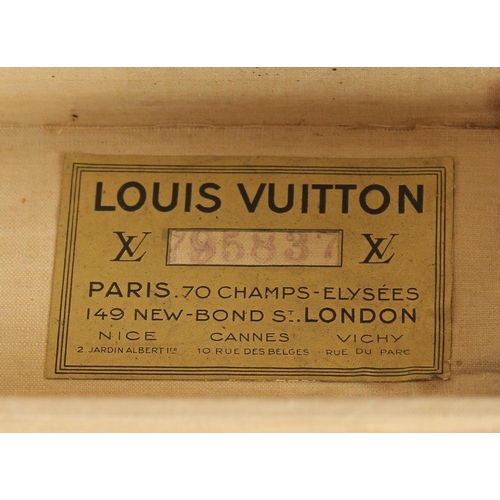 1503 - A LOUIS VUITTON SUITCASE. No. 795837 with Louis Vuitton label, pull-out tray. Lock no. 106402. 23.5i... 