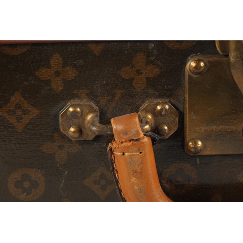 1504 - A LOUIS VUITTON SUITCASE. No. 810009 with Louis Vuitton label and ARTHUR GILBERT, New York. Lock no.... 