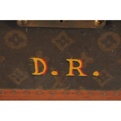 1504 - A LOUIS VUITTON SUITCASE. No. 810009 with Louis Vuitton label and ARTHUR GILBERT, New York. Lock no.... 