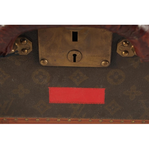 1505 - A LOUIS VUITTON SUITCASE. No. 82154 with Louis Vuitton label. Saks & Co., New York label. Pull-out t... 