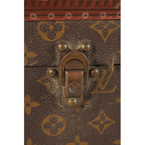 1506 - A LOUIS VUITTON SUITCASE. Louis Vuitton label missing. Lock no. H9. 27.5ins long x 18.5ins wide x 8.... 