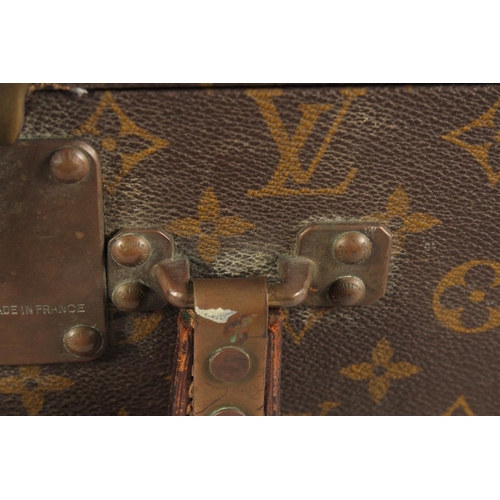 1506 - A LOUIS VUITTON SUITCASE. Louis Vuitton label missing. Lock no. H9. 27.5ins long x 18.5ins wide x 8.... 