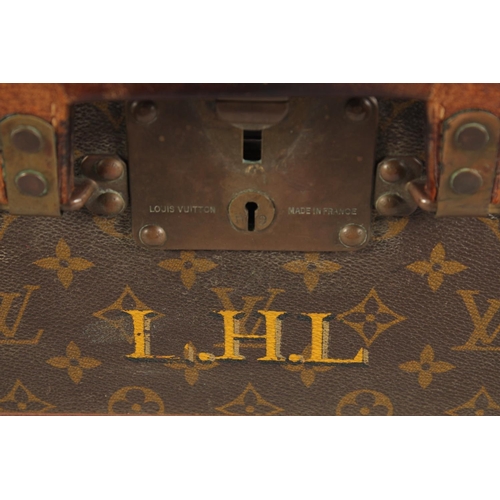 1506 - A LOUIS VUITTON SUITCASE. Louis Vuitton label missing. Lock no. H9. 27.5ins long x 18.5ins wide x 8.... 