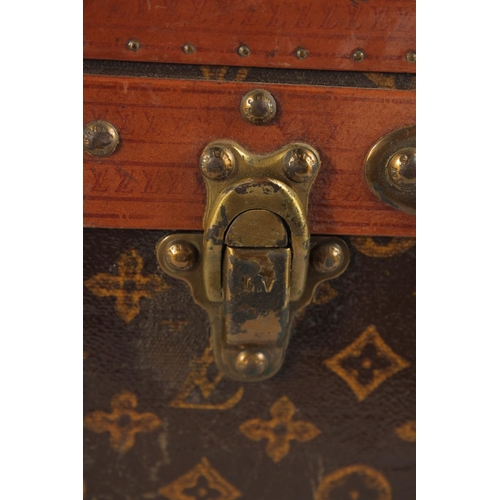 1507 - A LOUIS VUITTON SUITCASE. No. 771989 with Louis Vuitton label. FROM Saks & Co., New York. Lock no. 0... 