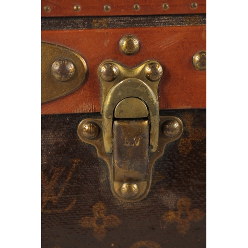 1508 - A LOUIS VUITTON SUITCASE. Label faint, also retail label faint, with lift-out tray. Lock no. 065564.... 