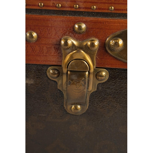 1510 - A LOUIS VUITTON SUITCASE. No. 819485, with Louis Vuitton label. From Arthur Gilbert, New York. With ... 