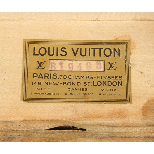 1510 - A LOUIS VUITTON SUITCASE. No. 819485, with Louis Vuitton label. From Arthur Gilbert, New York. With ... 