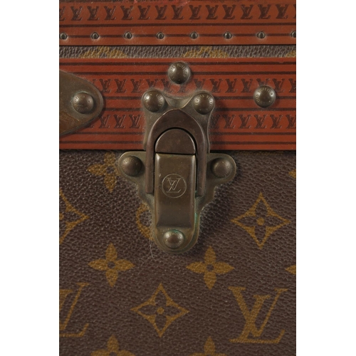 1511 - A LOUIS VUITTON SUITCASE. No. 920890, with Louis Vuitton label. Brass lock no 147171. Handle missing... 