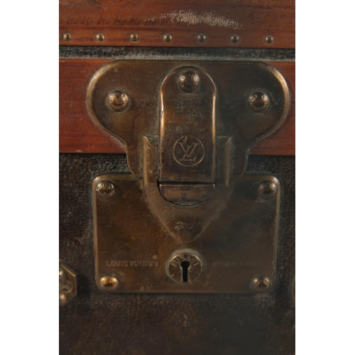 1512 - A LOUIS VUITTON SUITCASE. No. 821055, with Louis Vuitton label. Brass lock no.108381. Handle missing... 