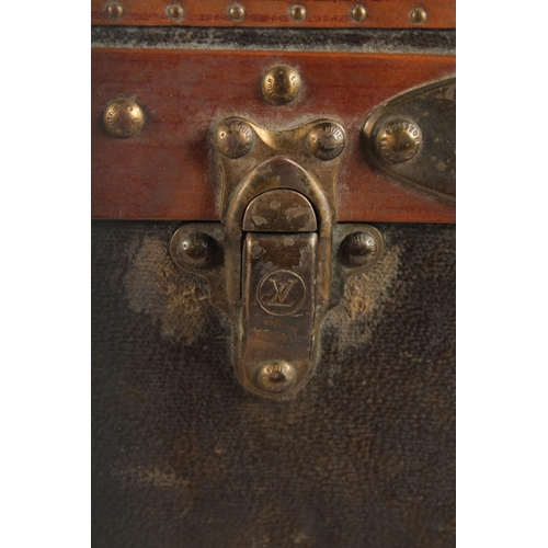 1512 - A LOUIS VUITTON SUITCASE. No. 821055, with Louis Vuitton label. Brass lock no.108381. Handle missing... 