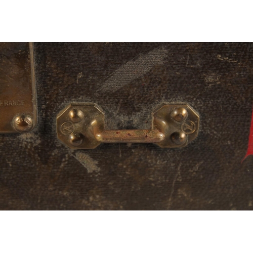 1512 - A LOUIS VUITTON SUITCASE. No. 821055, with Louis Vuitton label. Brass lock no.108381. Handle missing... 