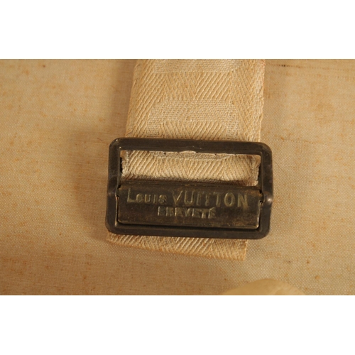 1513 - A LOUIS VUITTON SUITCASE. No. 788153, with Louis Vuitton label. Brass lock 113, with two labels SWED... 