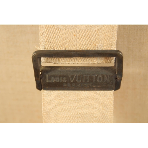 1513 - A LOUIS VUITTON SUITCASE. No. 788153, with Louis Vuitton label. Brass lock 113, with two labels SWED... 