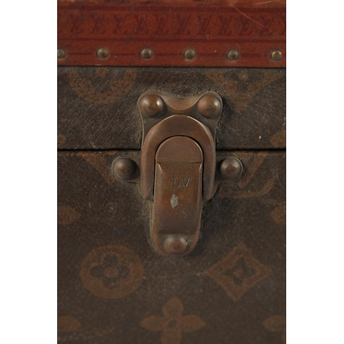 1513 - A LOUIS VUITTON SUITCASE. No. 788153, with Louis Vuitton label. Brass lock 113, with two labels SWED... 