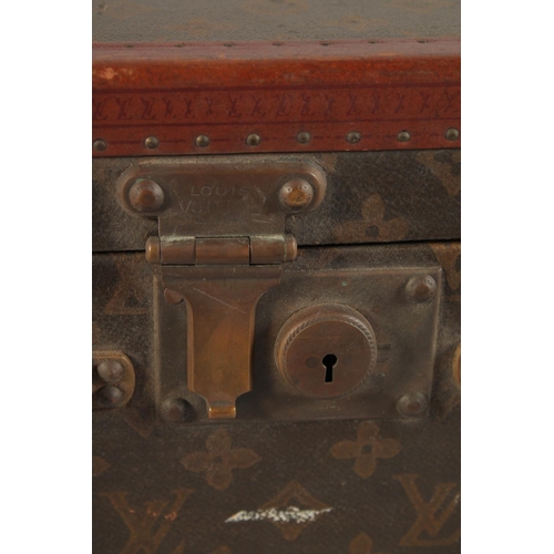 1513 - A LOUIS VUITTON SUITCASE. No. 788153, with Louis Vuitton label. Brass lock 113, with two labels SWED... 