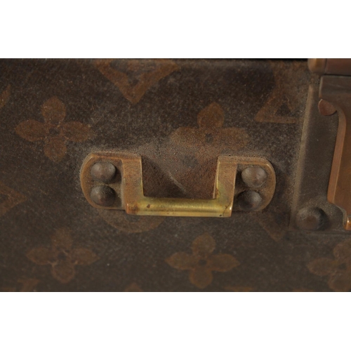 1513 - A LOUIS VUITTON SUITCASE. No. 788153, with Louis Vuitton label. Brass lock 113, with two labels SWED... 