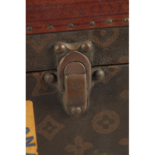 1513 - A LOUIS VUITTON SUITCASE. No. 788153, with Louis Vuitton label. Brass lock 113, with two labels SWED... 