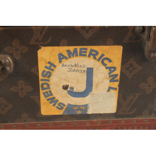 1513 - A LOUIS VUITTON SUITCASE. No. 788153, with Louis Vuitton label. Brass lock 113, with two labels SWED... 