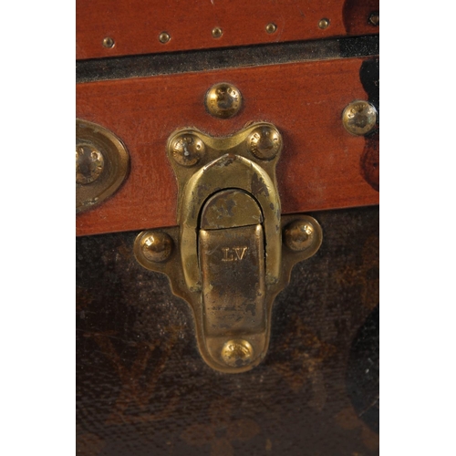 1514 - A LOUIS VUITTON SUITCASE. No. 81494, with Louis Vuitton label. Related label, bought from SAKS & Co.... 