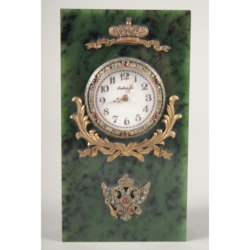 1521 - A GOOD RUSSIAN JADE, SILVER, AND DIAMOND SET CLOCK. 4.5ins high x 2.25ins wide. Marks, H. W., Faberg... 