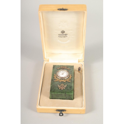 1521 - A GOOD RUSSIAN JADE, SILVER, AND DIAMOND SET CLOCK. 4.5ins high x 2.25ins wide. Marks, H. W., Faberg... 