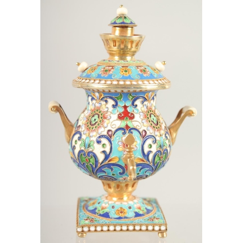 1522 - A MINIATURE RUSSIAN SILVER GILT AND CLOISONNE ENAMEL SAMOVAR. 3.75ins high, Mark 84