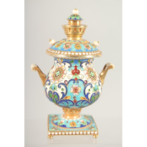 1522 - A MINIATURE RUSSIAN SILVER GILT AND CLOISONNE ENAMEL SAMOVAR. 3.75ins high, Mark 84