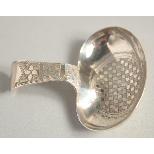 1555 - A GEORGE III SILVER ENGRAVED CADDY SPOON. Birmingham 1809.