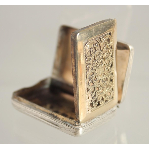 1561 - A GEORGIAN ENGRAVED SILVER VINAIGRETTE.