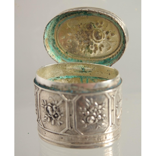 1564 - A SMALL FRENCH OVAL SILVER BOX AND COVER 1.25ins and a heart shaped box. (2).