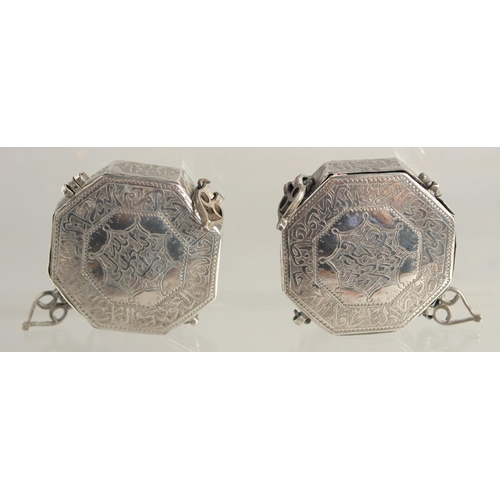 1566 - TWO SMALL ISLAMIC SILVER OCTAGONAL BOXES. 1.75ins.